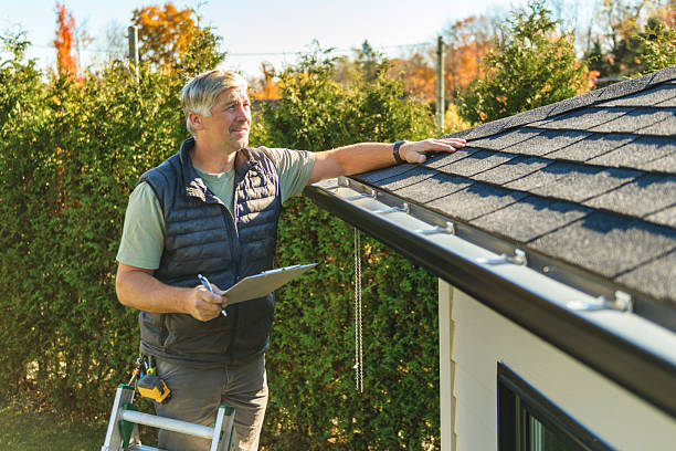 Professional Roof Inspection technician working in Leverett, MA